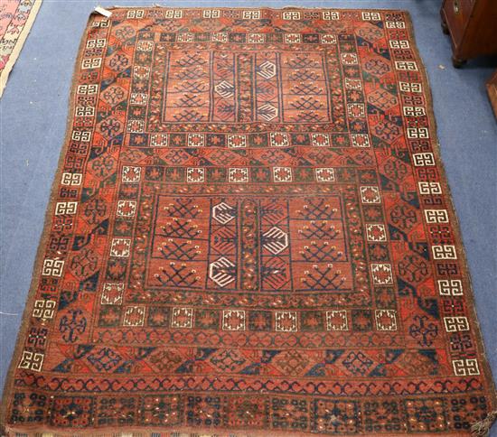 A Turkoman red ground rug 183 x 141cm